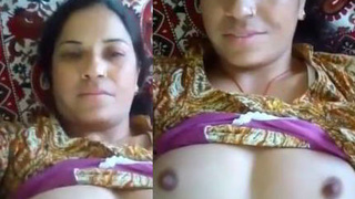Indian aunt reveals her large breasts and vagina