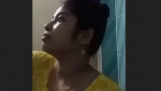 A stunning woman takes a bath and displays herself