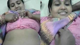 Attractive middle-aged woman in a saree and her superior engage in intimate activities