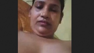 South Asian aunty reveals her breasts and intimate area